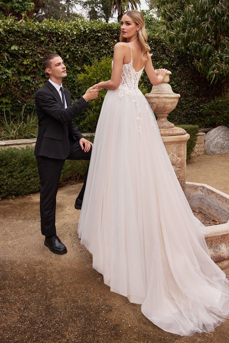 Wedding dress with thin straps and tulle skirt