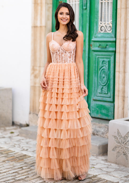 Peach prom dress with ruffles