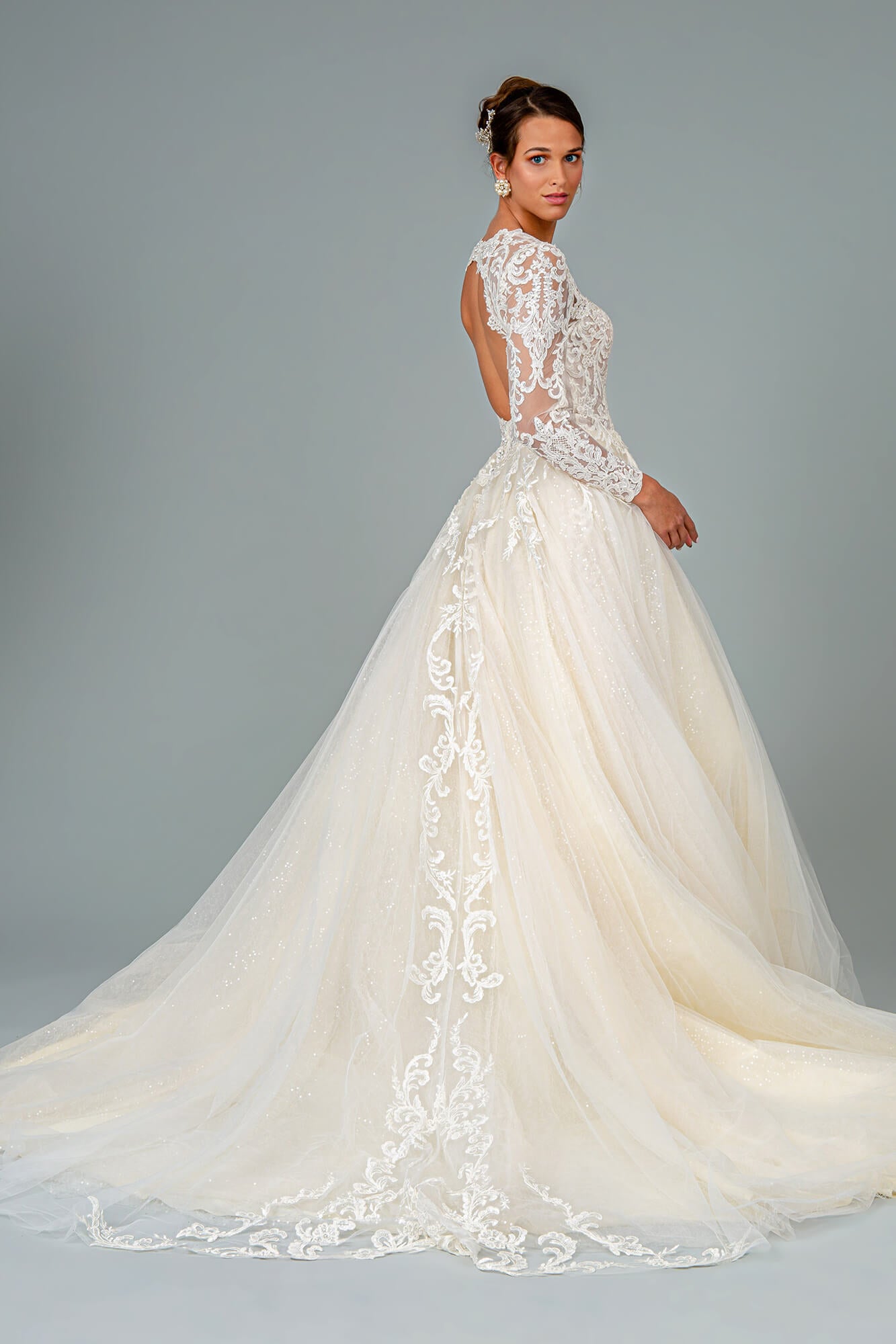 Wedding dress with long sleeves and open back