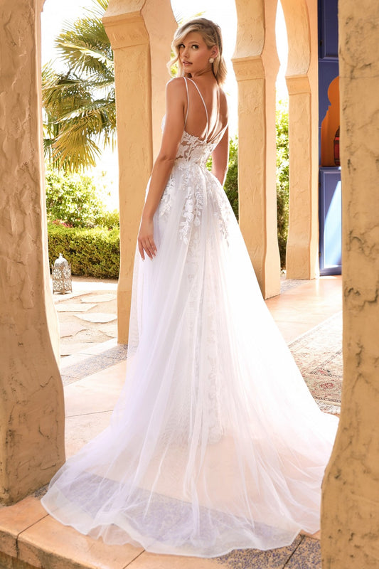 Tight-fitting wedding dress with overskirt